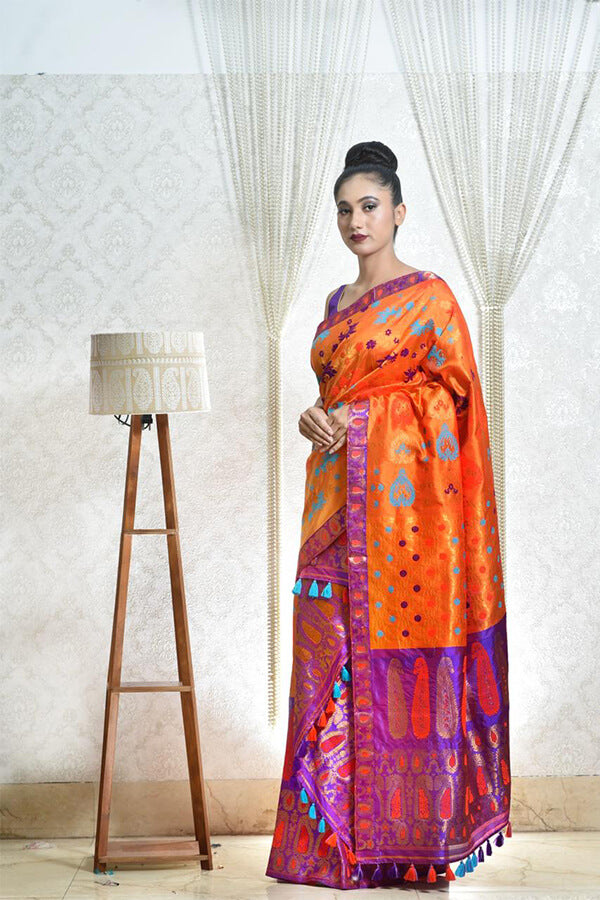 ORANGE AND PURPLE MEKHELA CHADAR WITH THREAD AND JARI WORK