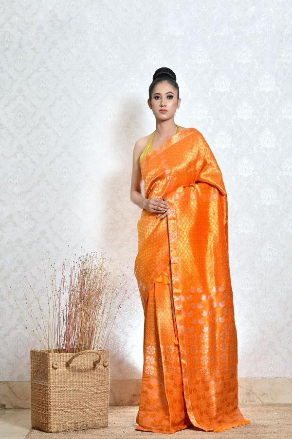 ORANGE MEKHELA CHADAR WITH GOLDEN AND SILVER JARI WORK